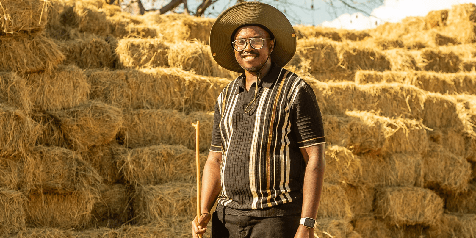 Farm team collaborating in the field with digital tools