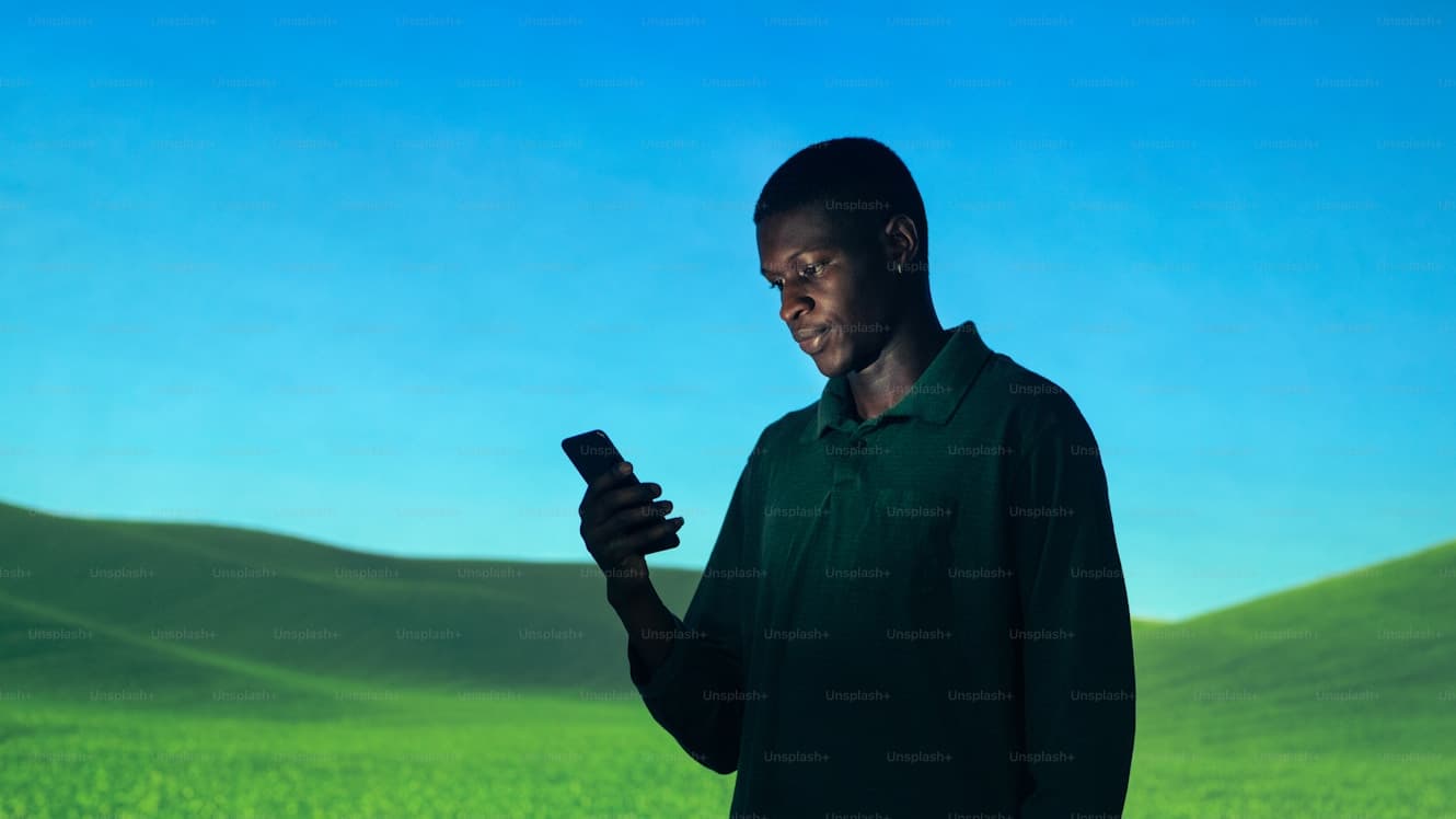 Mobile technology meeting African agriculture in the field, representing offline-first farm management tools